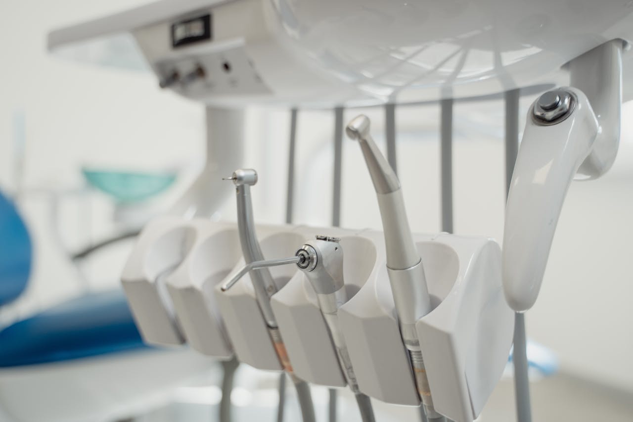Close-up of modern dental instruments in a clinic, highlighting advanced technology in dentistry.